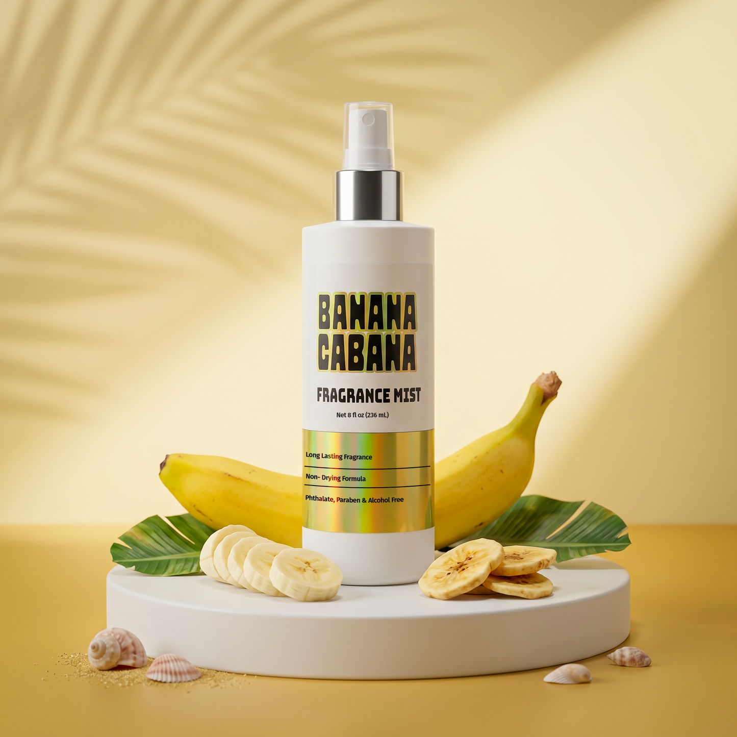 Banana Cabana fragrance mist bottle with bananas and leaves on a yellow background