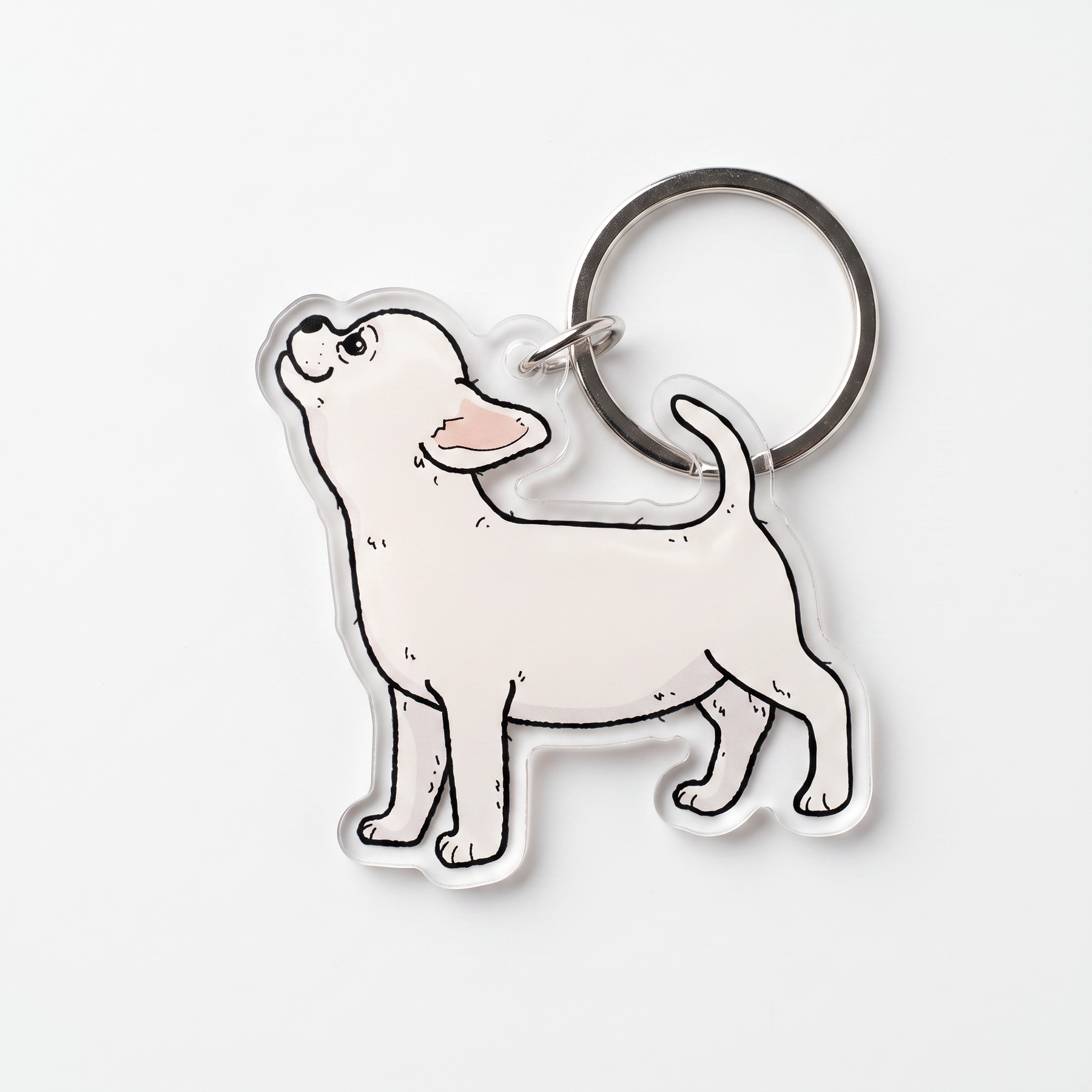an acrylic dog keychain of a chihuahua sniffing the air